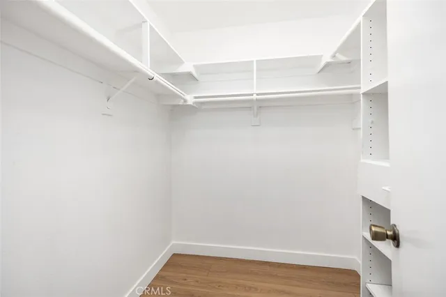 a view of an empty walk in closet