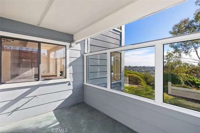 a bathroom with a bathtub and window