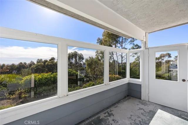 a view of a building from a balcony