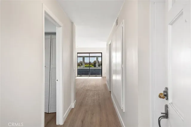 a view of a bathroom from the hallway