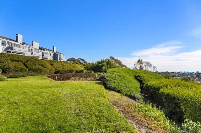 a view of a lake with a building in the background