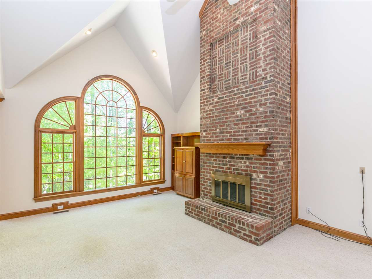 1609 Adams Mountain Road Raleigh, NC 27614 - Photo 7 of 29 Wow! Solid wood, high end, Palladian windows adorn the family room and offer serene views throughout the year. Family Room