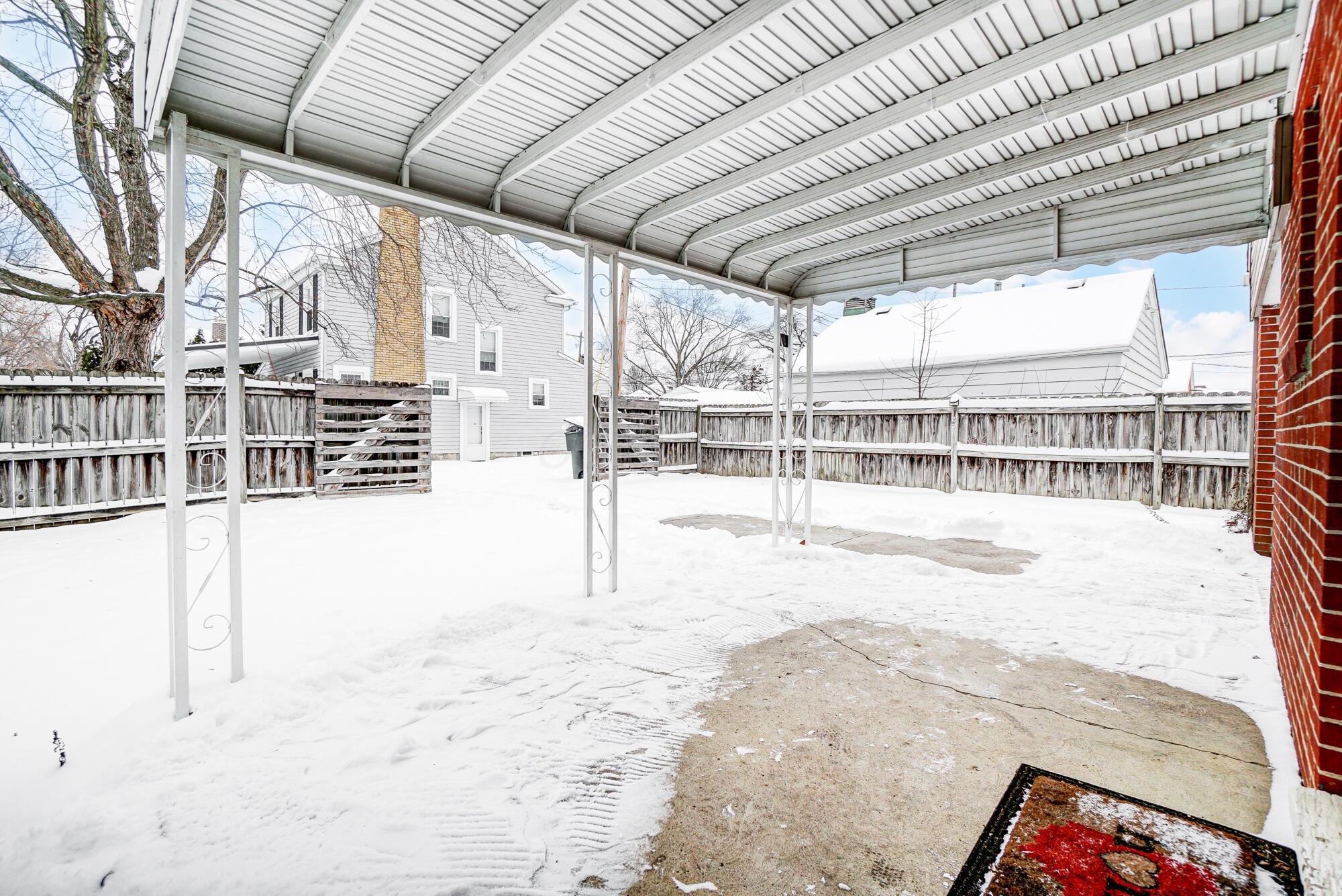 2990 Parkside Road Columbus, OH 43204 - Photo 31 of 34 Nice sized covered back patio and great fenced in yard!