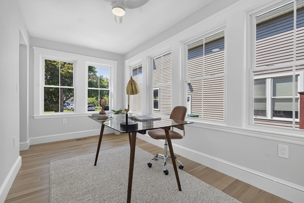 20 Saltonstall Road Medford, MA 02155 - Photo 18 of 41 a view of a workspace with furniture and a window
