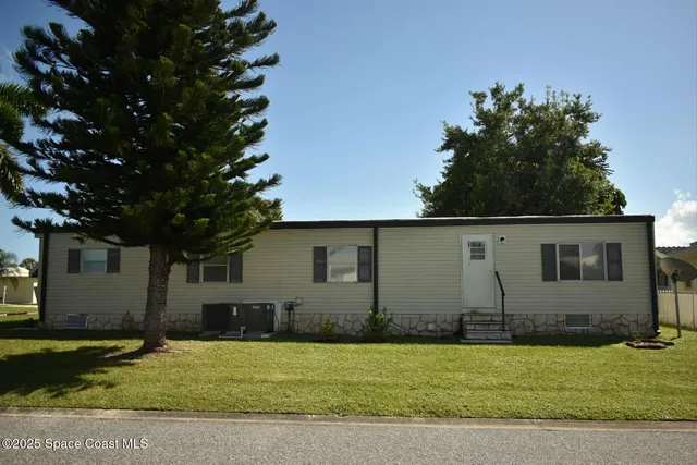 $99,499 | 1251 Waterway Drive, Barefoot Bay, FL 32976