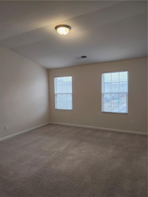 269 Sidney Lanier Avenue Athens, GA 30607 - Photo 11 of 13 an empty room with windows