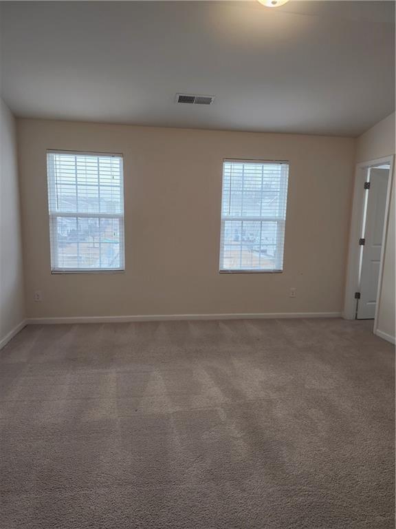269 Sidney Lanier Avenue Athens, GA 30607 - Photo 12 of 13 an empty room with a windows
