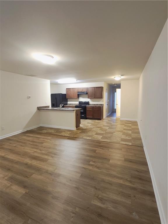 269 Sidney Lanier Avenue Athens, GA 30607 - Photo 6 of 11 a view of a kitchen with a sink and cabinets