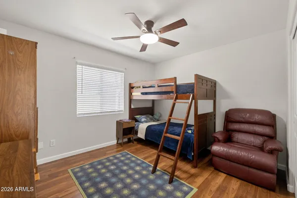 a work room with furniture and a window