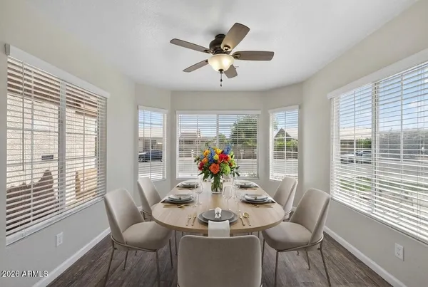a view of a dining room with furniture window and outside view