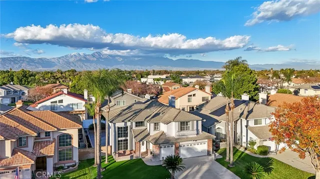 a view of multiple houses with a city street