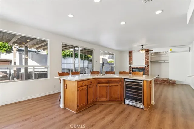 a kitchen with stainless steel appliances a stove a sink and a refrigerator
