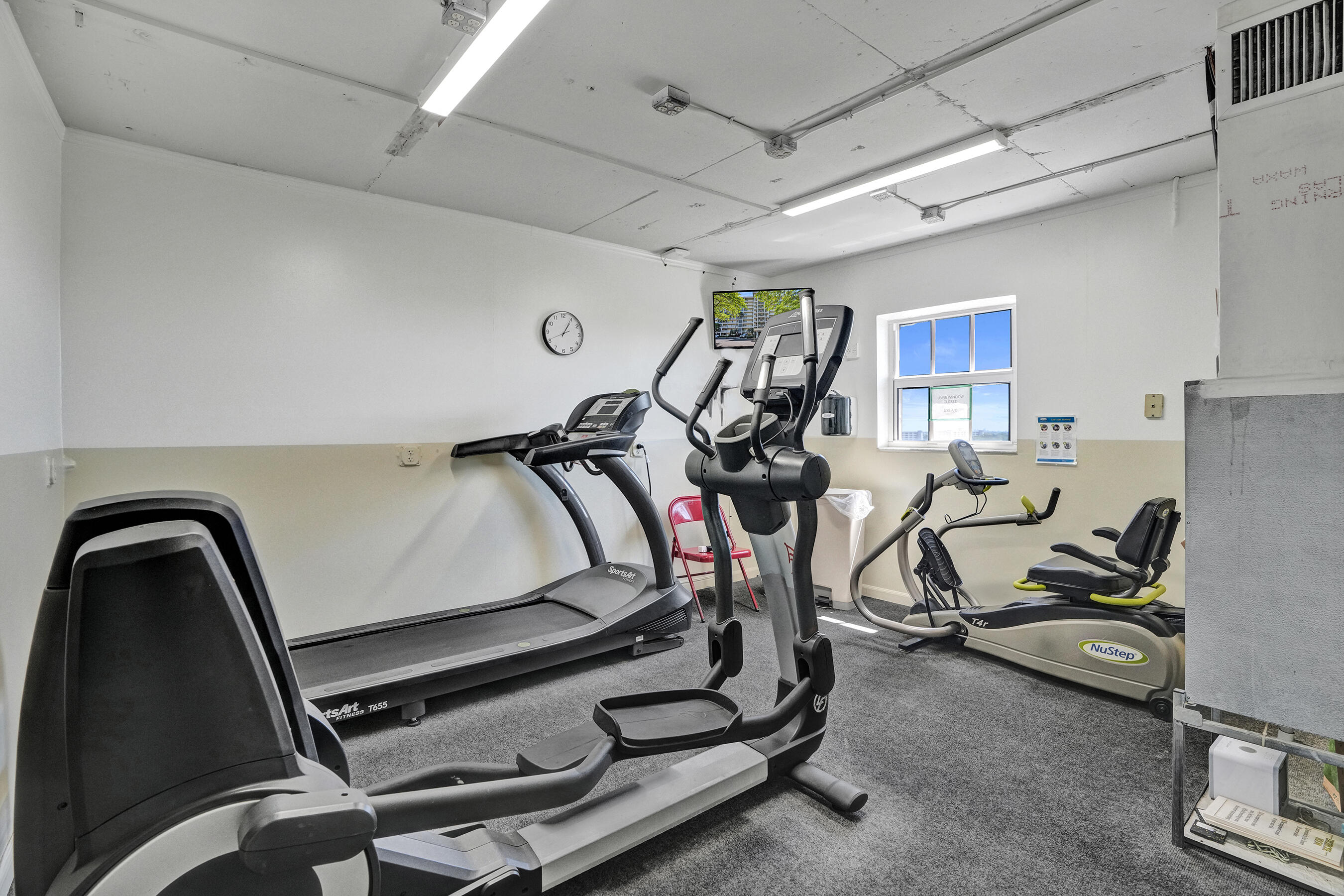 3520 Oaks Way, Unit 1010 Pompano Beach, FL 33069 - Photo 53 of 67 a view of a room with gym equipment