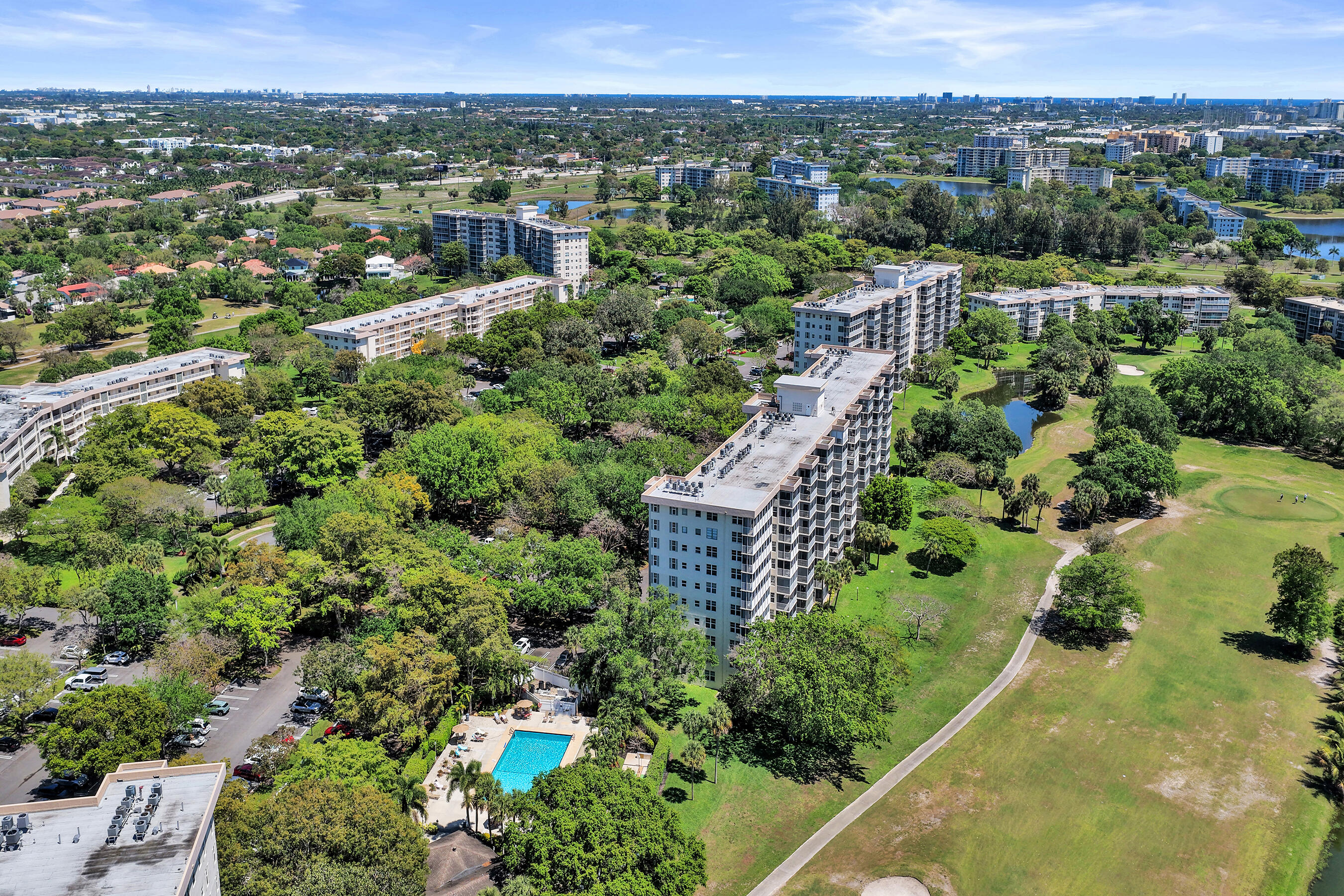 3520 Oaks Way, Unit 1010 Pompano Beach, FL 33069 - Photo 56 of 67 an aerial view of multiple house