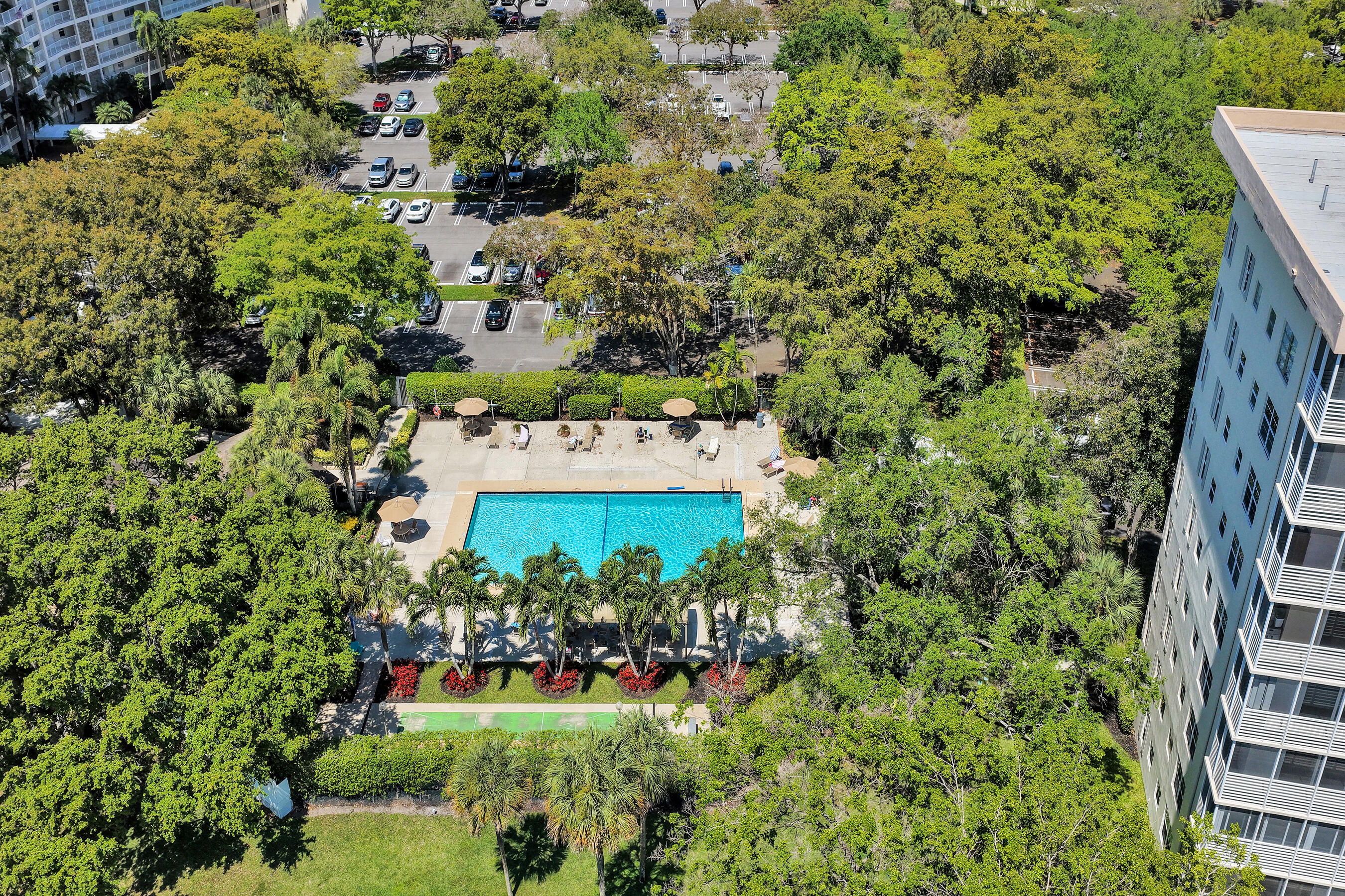3520 Oaks Way, Unit 1010 Pompano Beach, FL 33069 - Photo 57 of 67 an aerial view of a house with a yard