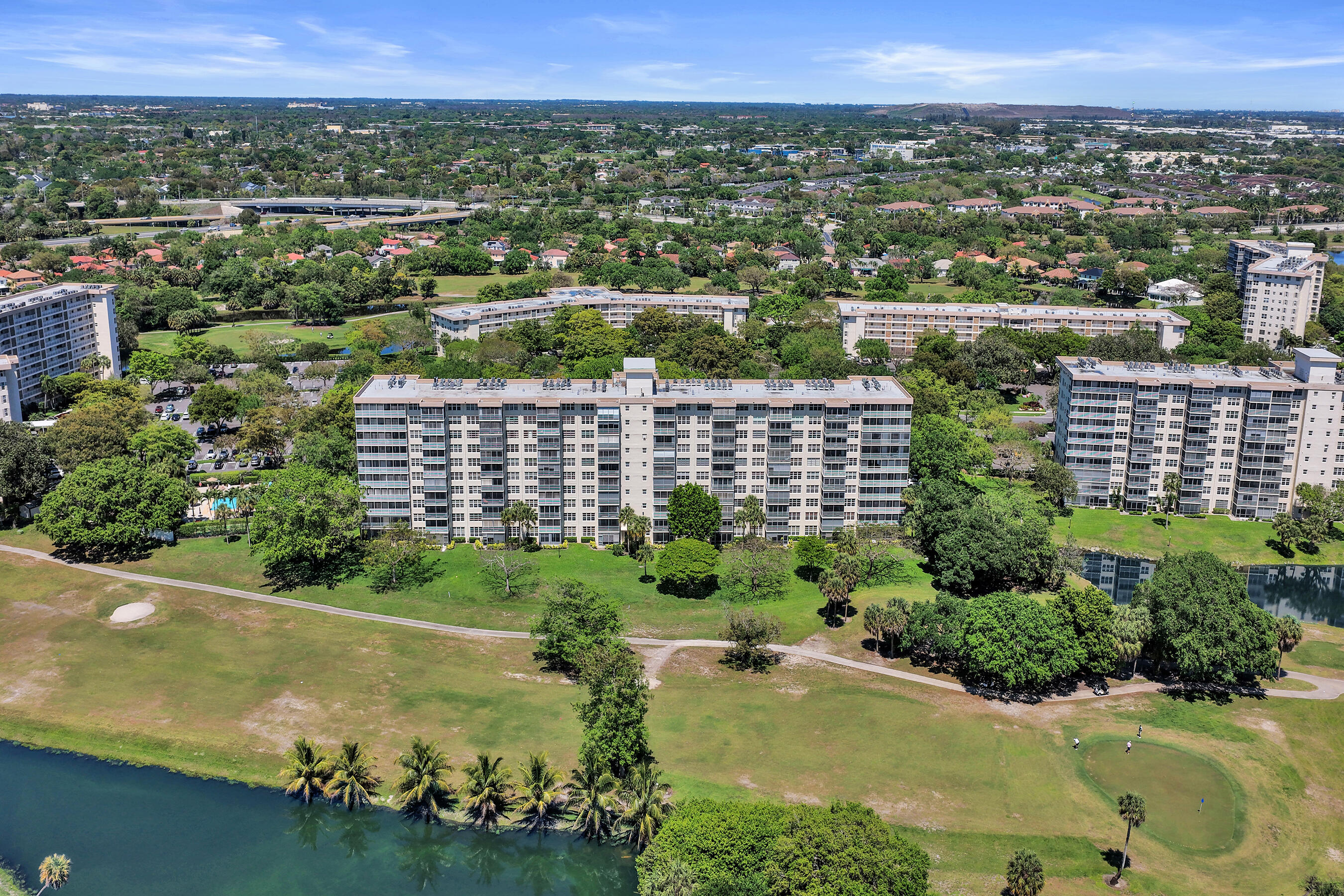 3520 Oaks Way, Unit 1010 Pompano Beach, FL 33069 - Photo 66 of 67 an aerial view of a residential houses with city view