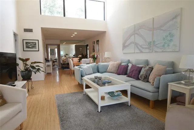 a bedroom with bed and a night stand