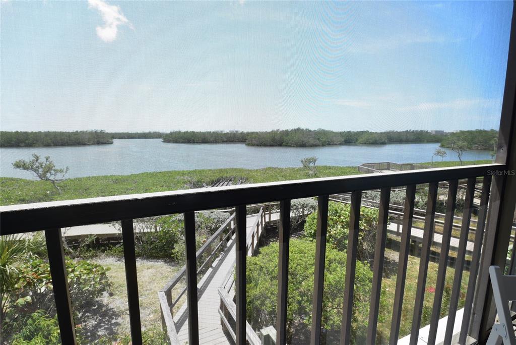 1512 Pelican Point Drive, Unit BA264 Sarasota, FL 34231 - Photo 8 of 44 a city view from a balcony