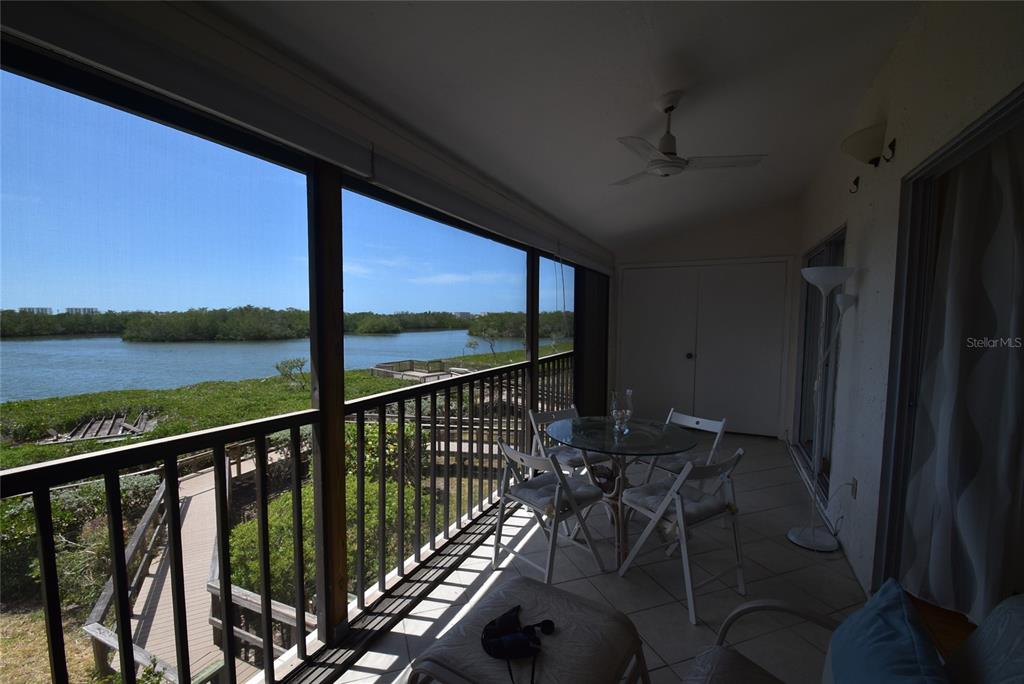 1512 Pelican Point Drive, Unit BA264 Sarasota, FL 34231 - Photo 9 of 44 a view of a balcony with chairs