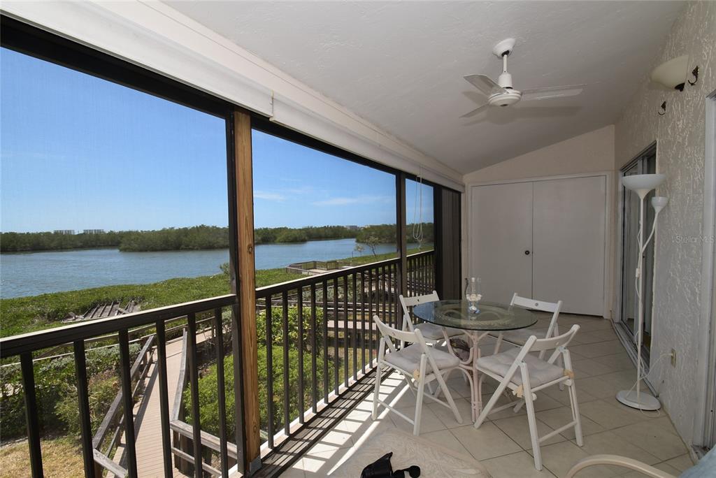 1512 Pelican Point Drive, Unit BA264 Sarasota, FL 34231 - Photo 10 of 44 a view of a balcony with chairs
