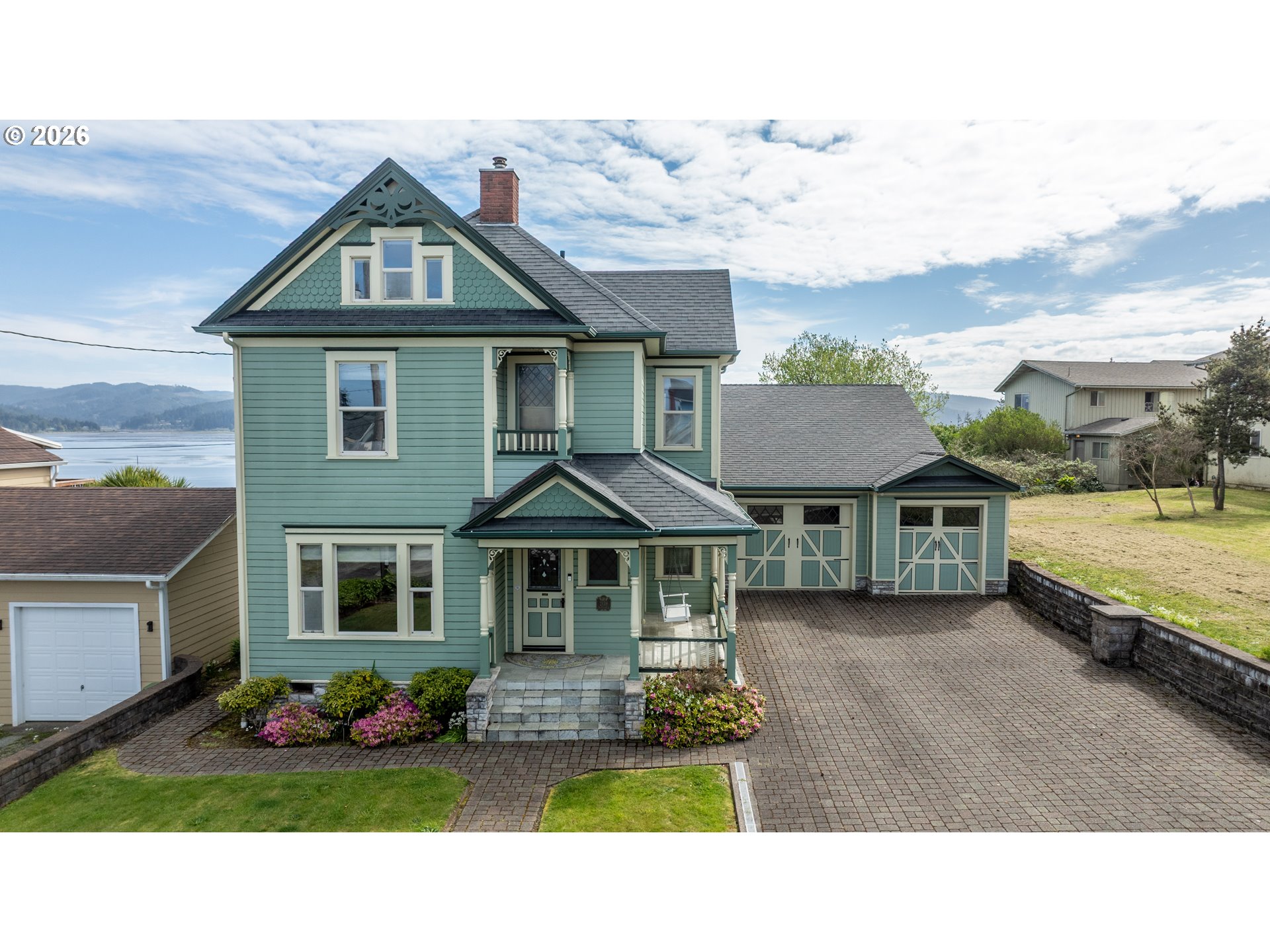 2139 McPherson Avenue North Bend, OR 97459 - Photo 1 of 35 a front view of a house with a yard