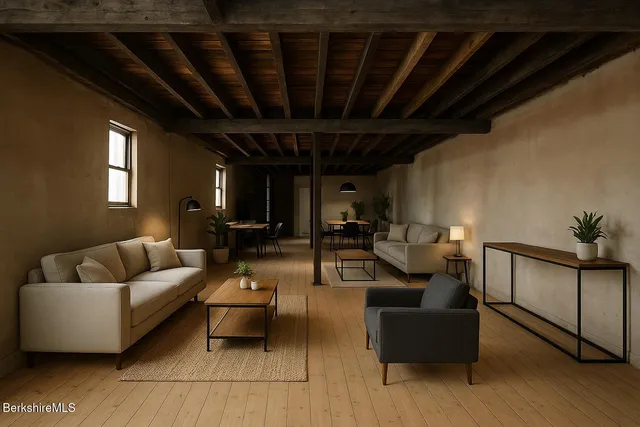 a view of entryway with wooden floor and windows