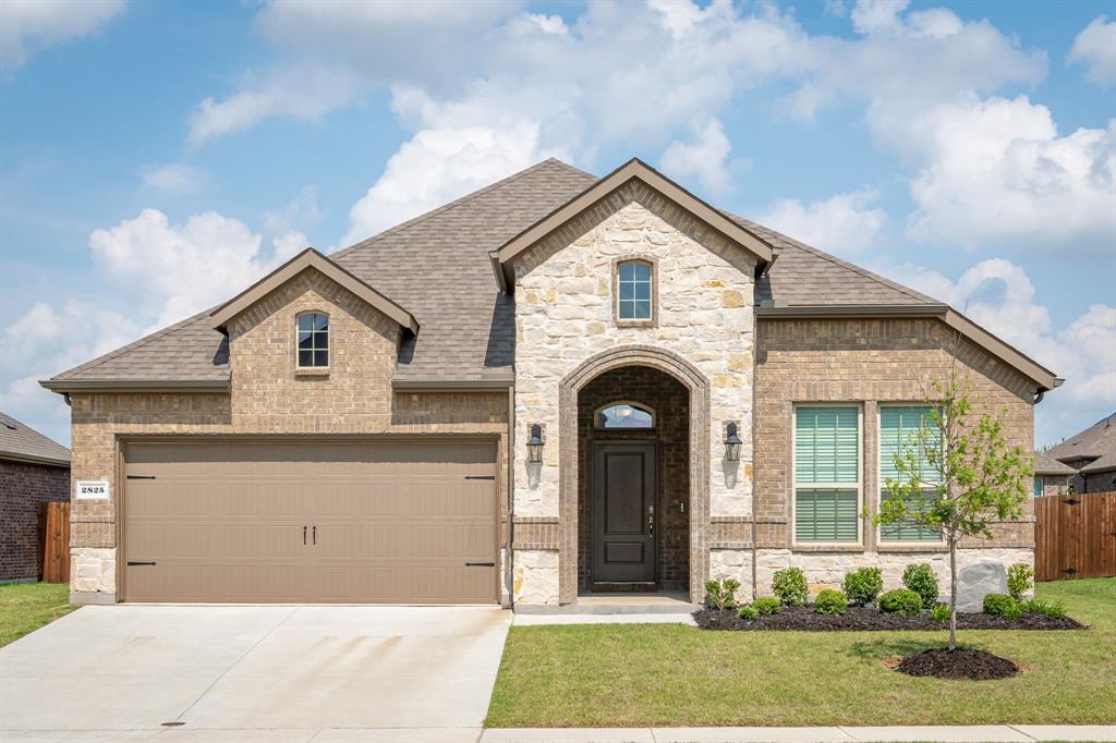 2825 Faro Road Aubrey, TX 76227 - Photo 1 of 1 a front view of a house with garden