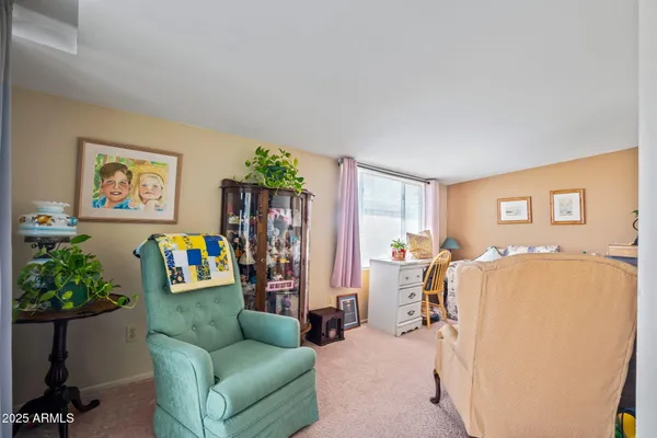 a living room with furniture and a couch