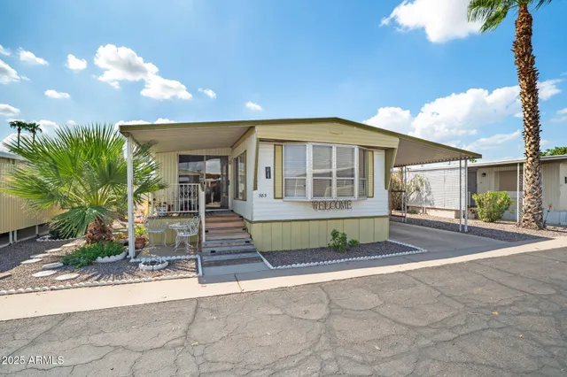 a front view of a house with a garage