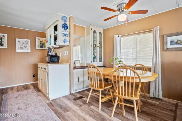 a kitchen with a refrigerator a sink and a stove