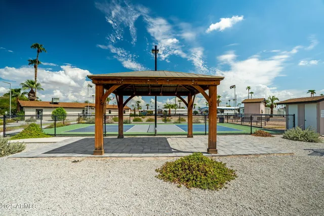 an aerial view of a house with yard