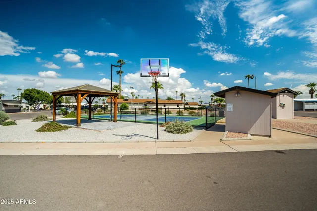 an aerial view of a house with a swimming pool
