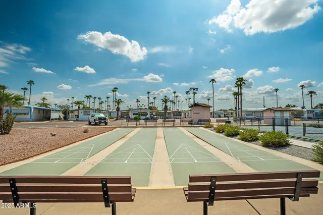 an aerial view of residential building with parking space