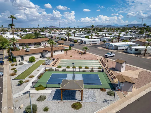 an aerial view of a house with a garden