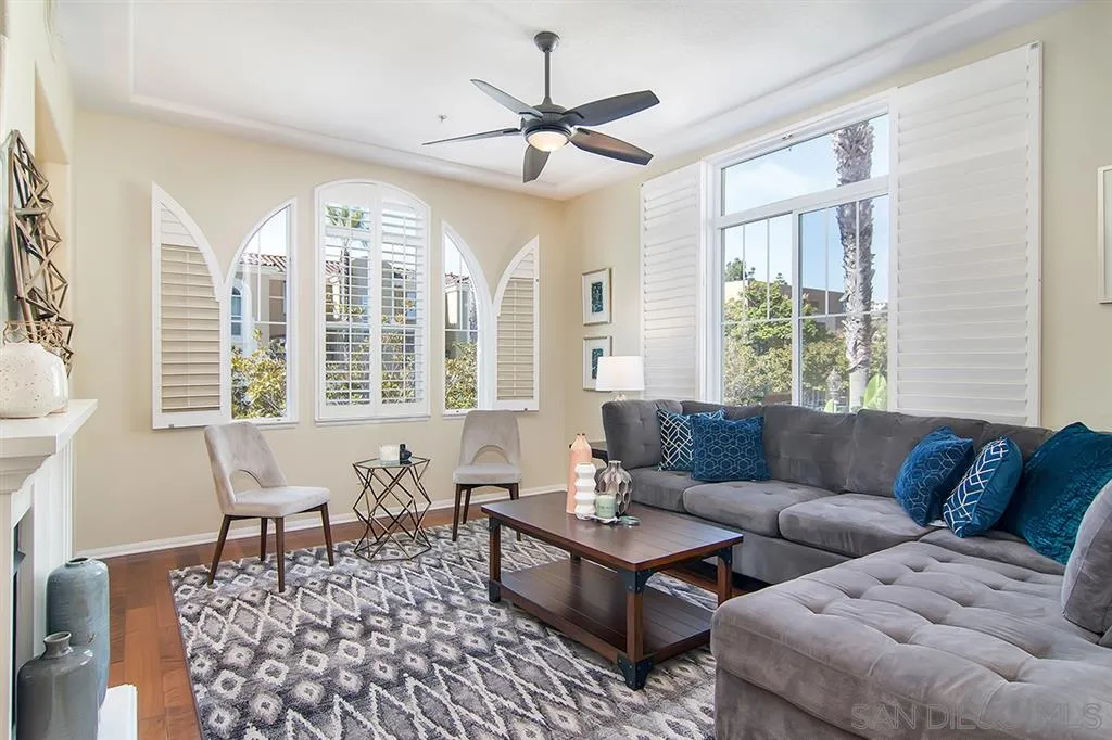 2230 Historic Decatur Road, Unit 63 San Diego, CA 92106 - Photo 1 of 25 a living room with furniture and a large window