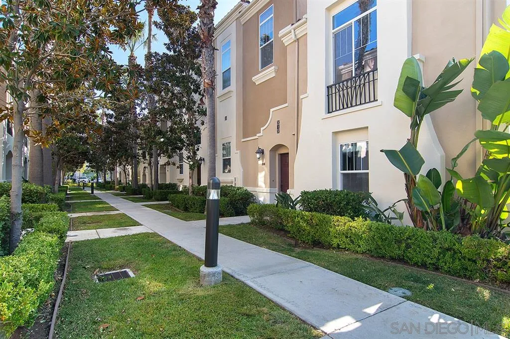 2230 Historic Decatur Road, Unit 63 San Diego, CA 92106 - Photo 23 of 25 a view of a building with a yard
