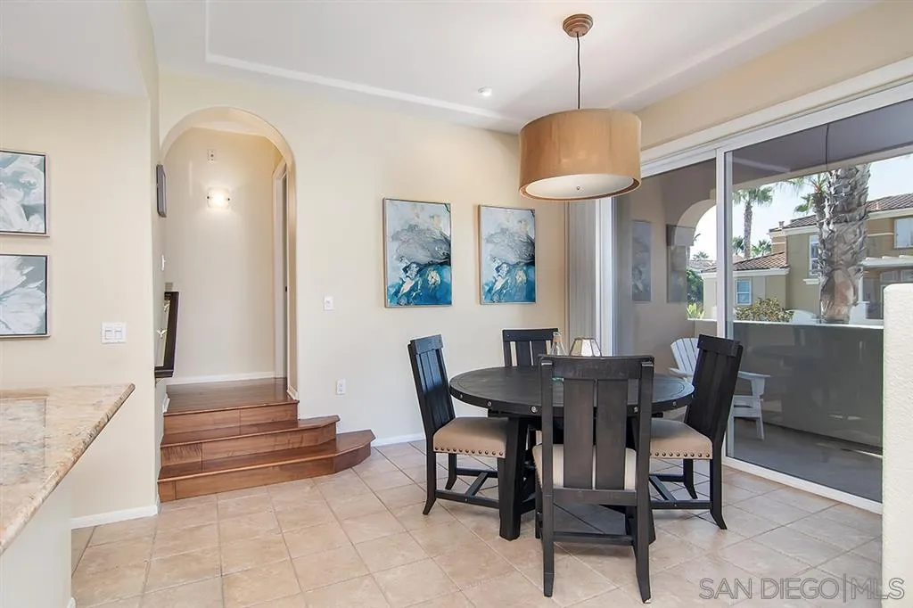 2230 Historic Decatur Road, Unit 63 San Diego, CA 92106 - Photo 7 of 25 a view of a dining room with furniture window and outside view