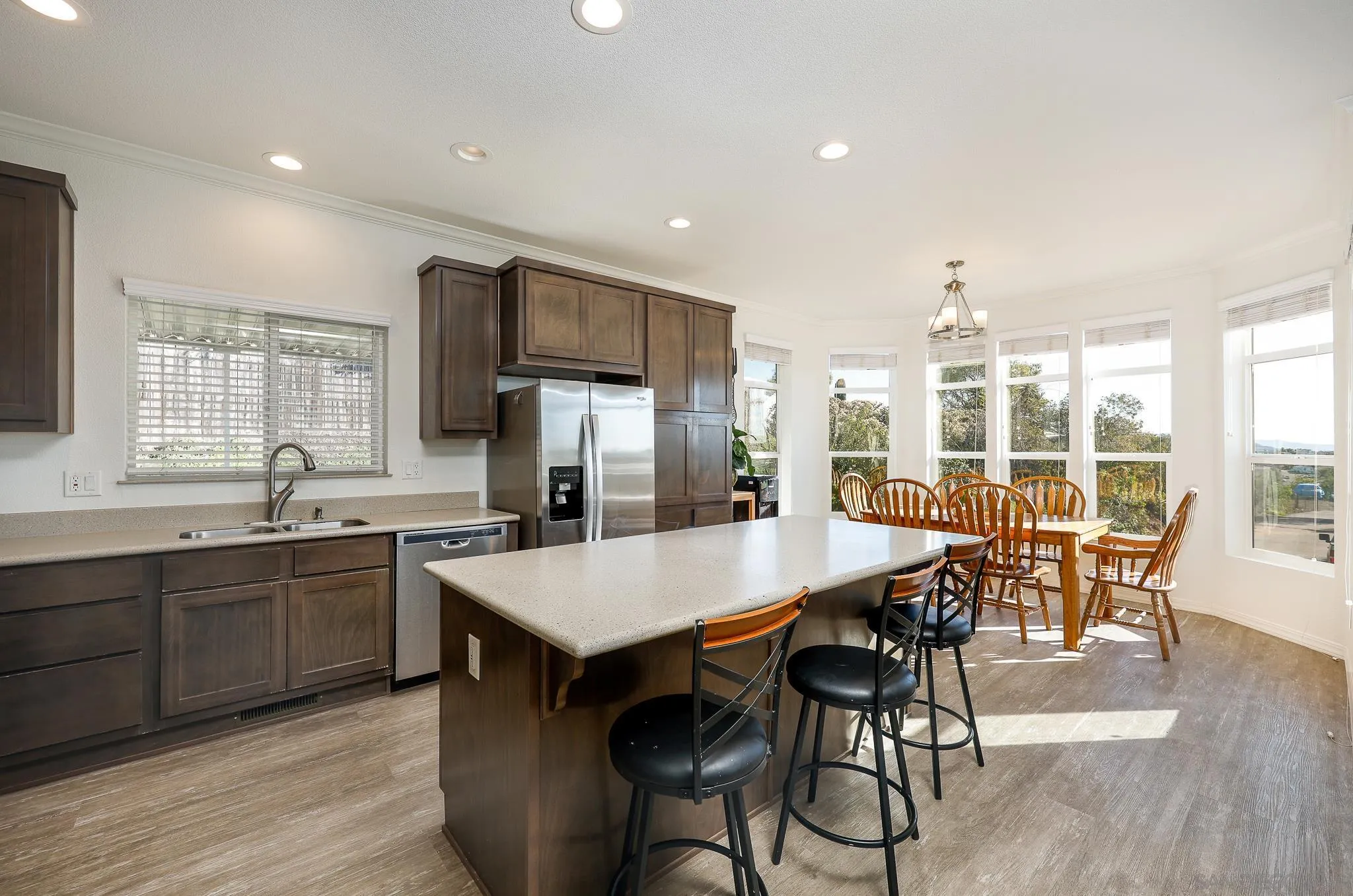 250 La Cresta Heights Road, Unit SPC 12 El Cajon, CA 92021 - Photo 1 of 37 a large kitchen with a table and chairs