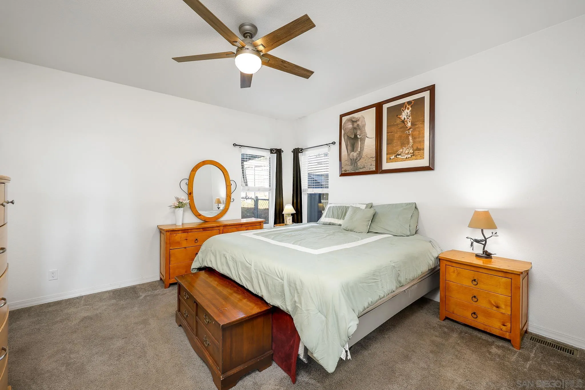 250 La Cresta Heights Road, Unit SPC 12 El Cajon, CA 92021 - Photo 19 of 37 a bedroom with a bed and a table