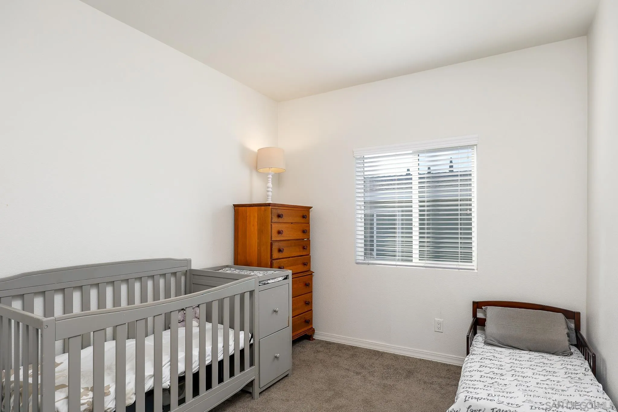 250 La Cresta Heights Road, Unit SPC 12 El Cajon, CA 92021 - Photo 26 of 37 a bedroom with a bed and wooden floor