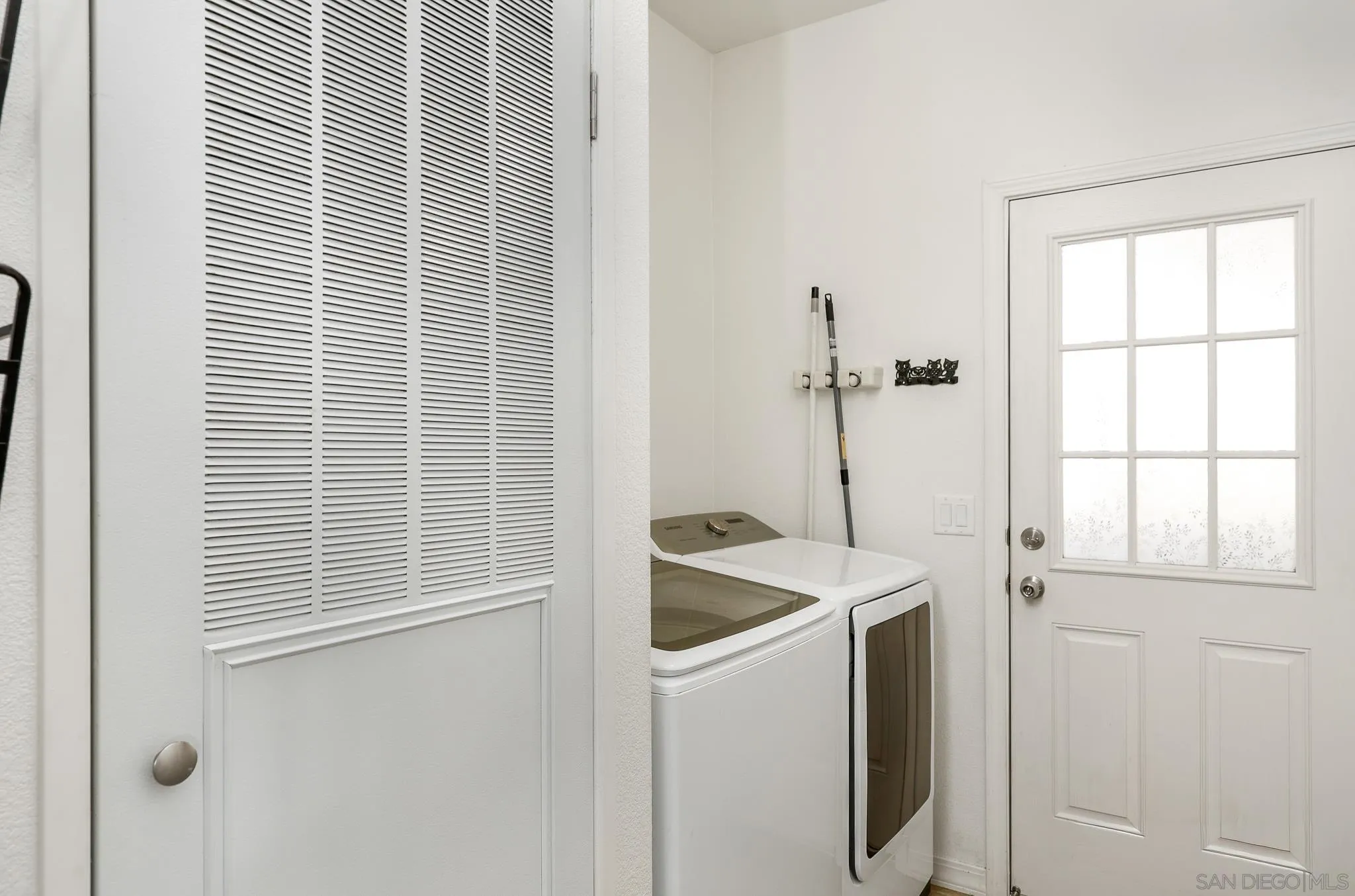 250 La Cresta Heights Road, Unit SPC 12 El Cajon, CA 92021 - Photo 27 of 37 a room that has a window and a white door
