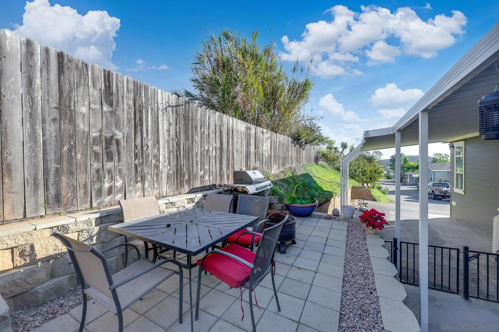 250 La Cresta Heights Road, Unit SPC 12 El Cajon, CA 92021 - Photo 32 of 37 a view of outdoor dining space with a table and chairs