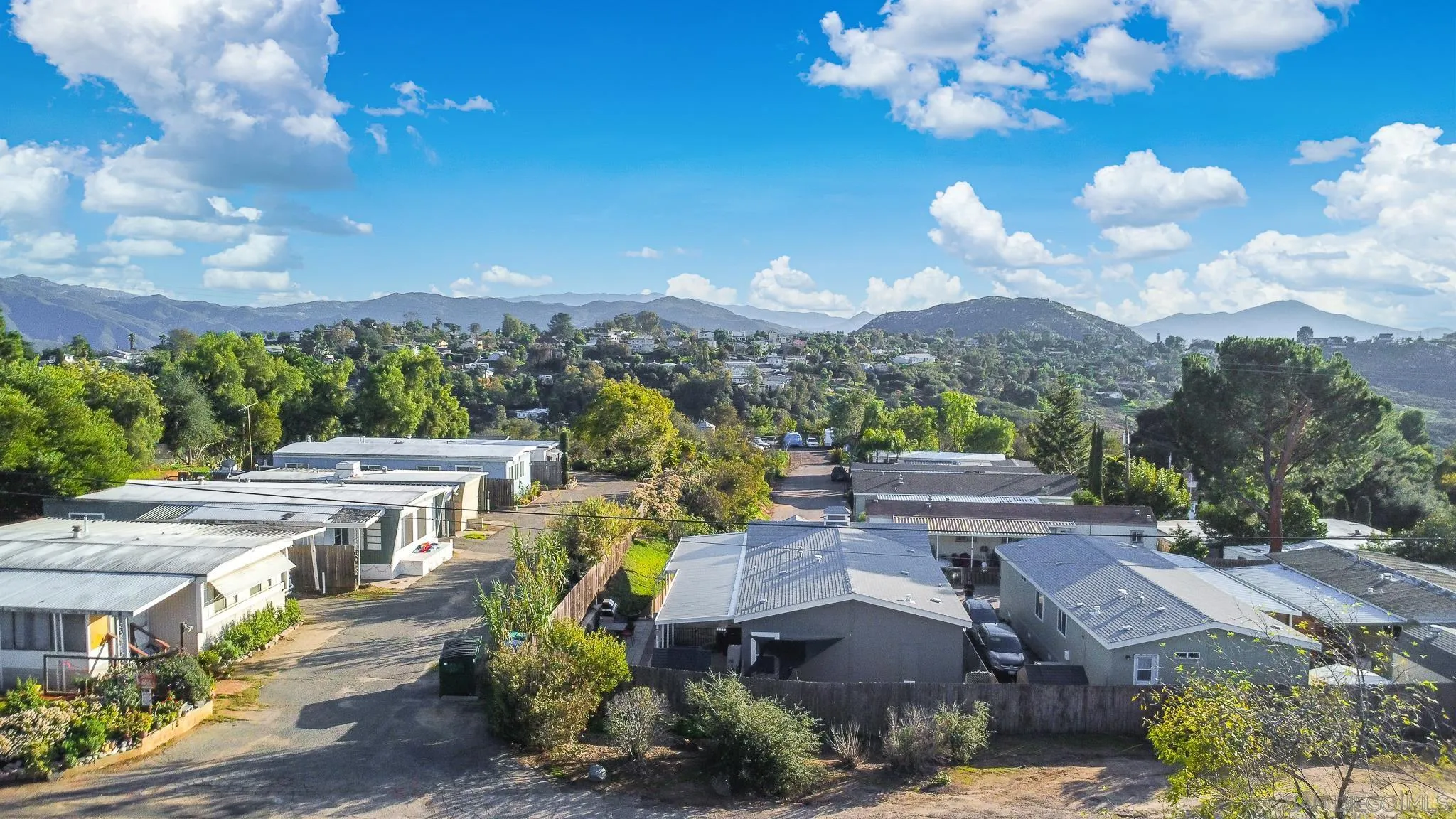 250 La Cresta Heights Road, Unit SPC 12 El Cajon, CA 92021 - Photo 7 of 37 a view of a house with a yard and sitting area