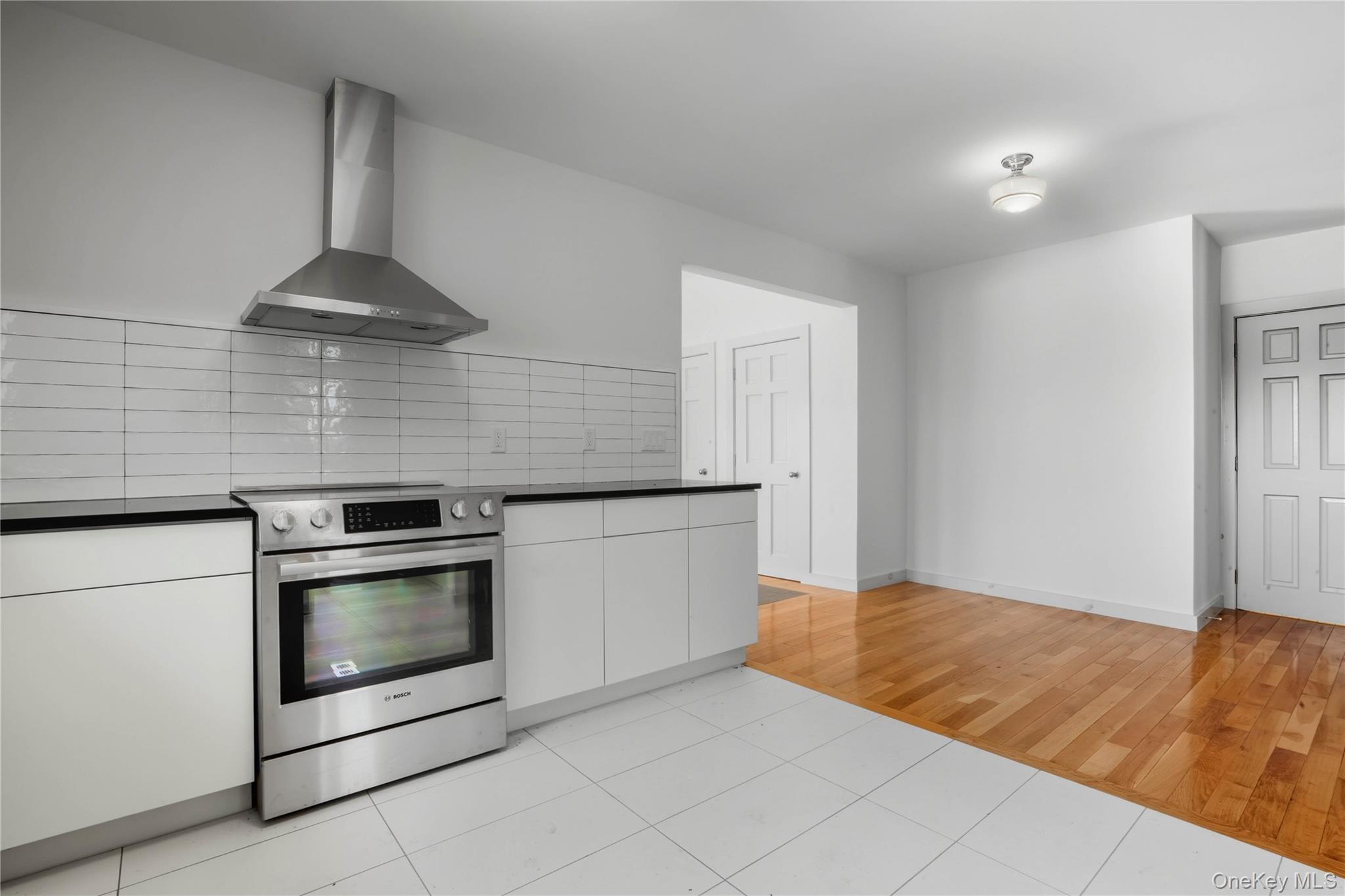 1091 Albany Post Road Gardiner, NY 12525 - Photo 11 of 50 a kitchen with granite countertop a stove and a sink