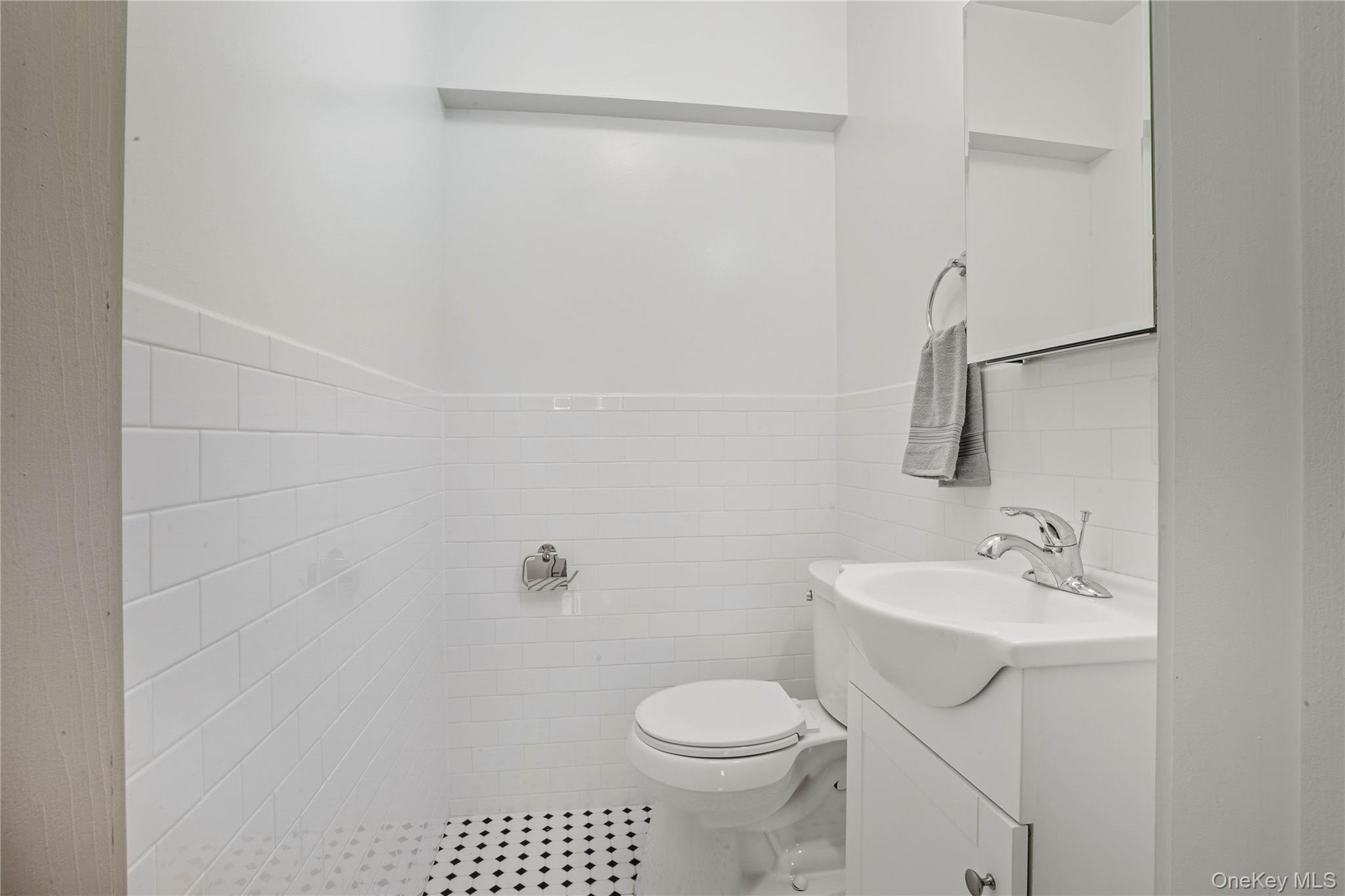 1091 Albany Post Road Gardiner, NY 12525 - Photo 12 of 50 a bathroom with a sink a toilet and shower