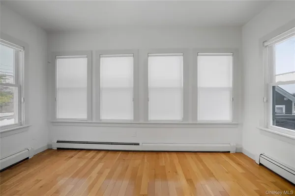 a view of a window in an empty room