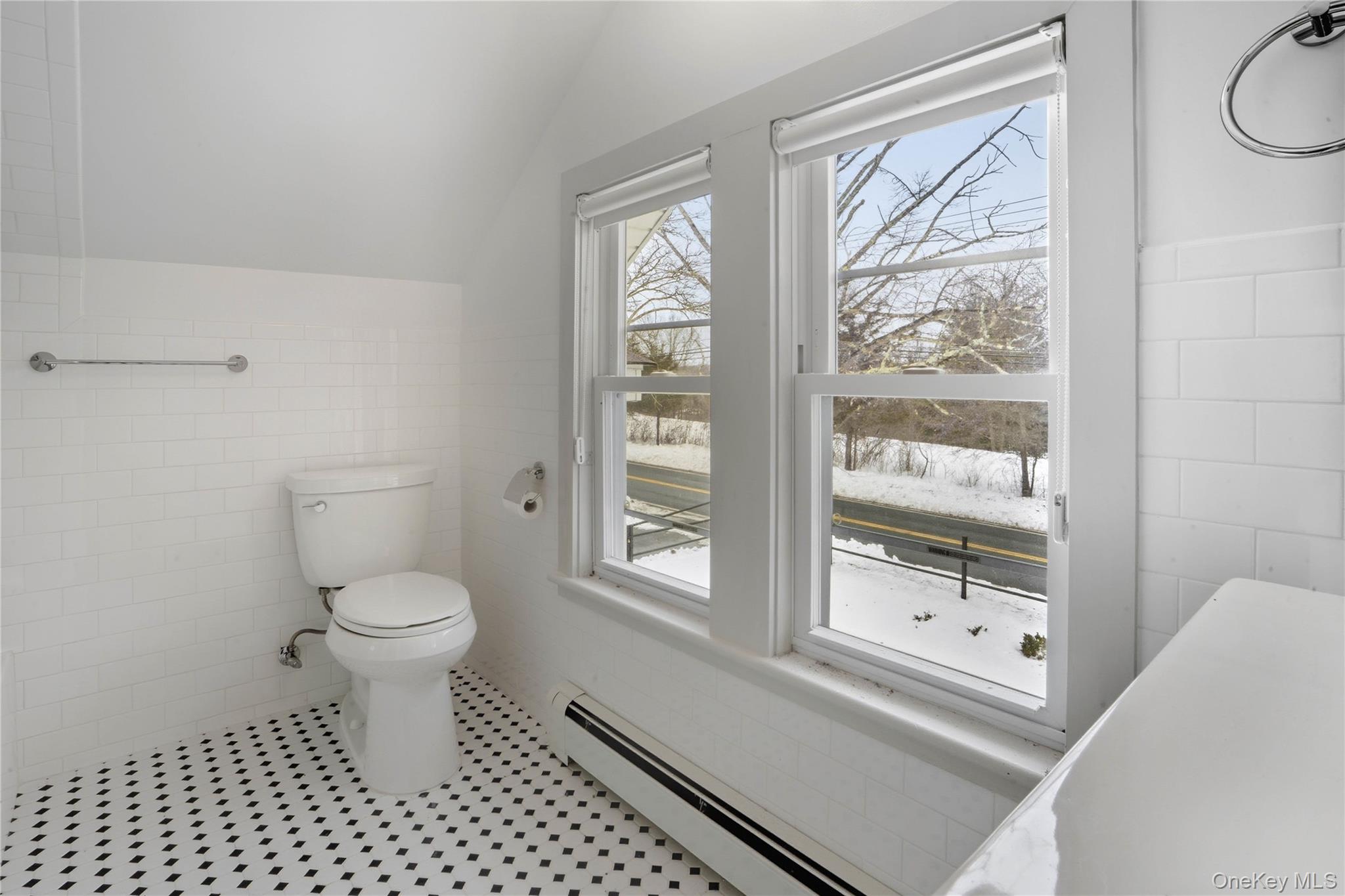 1091 Albany Post Road Gardiner, NY 12525 - Photo 26 of 50 a bathroom with a toilet a window and a shower
