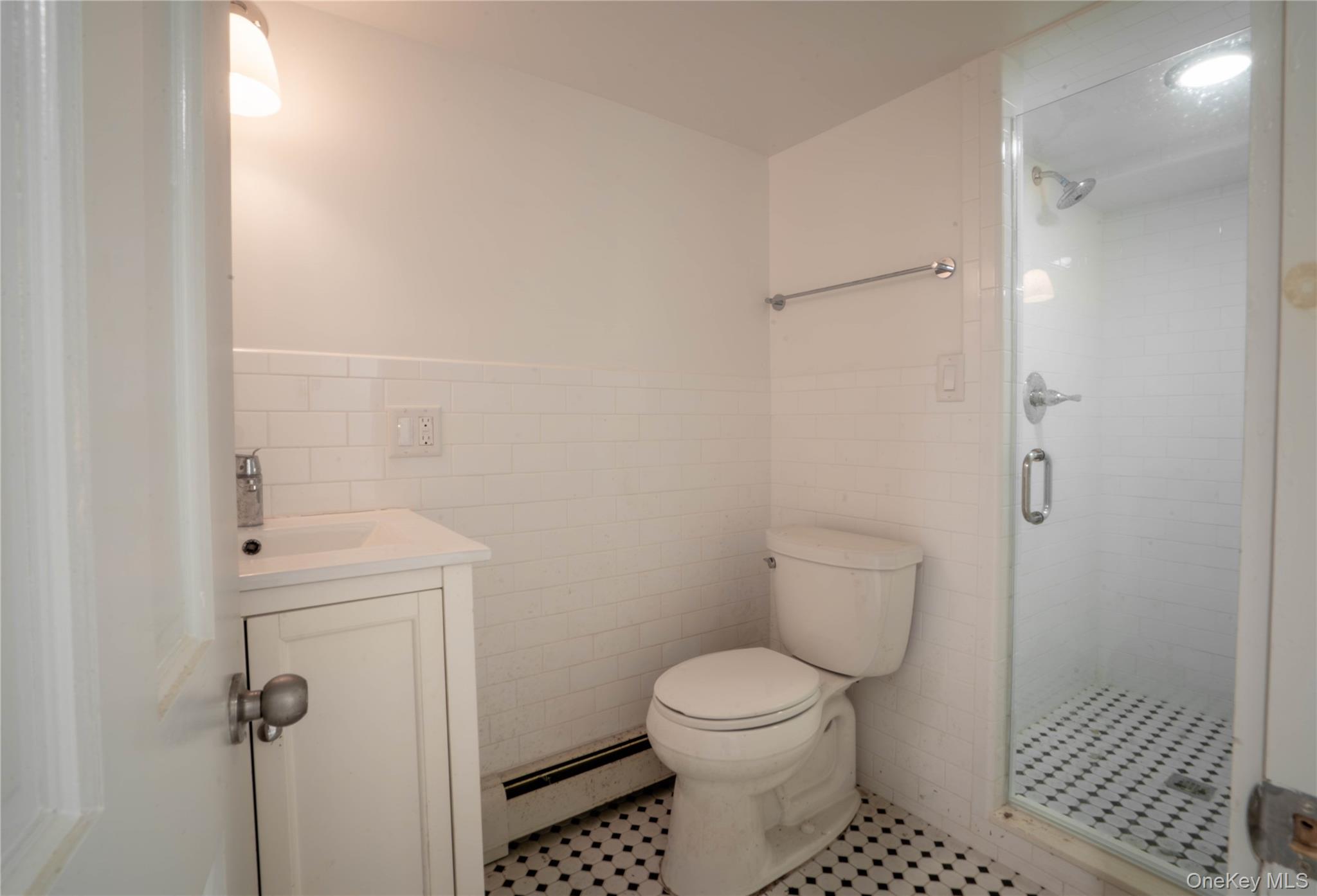 1091 Albany Post Road Gardiner, NY 12525 - Photo 35 of 50 a bathroom with a toilet and a shower