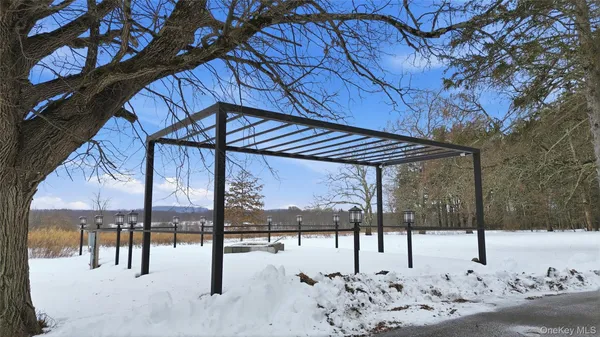 a view of a backyard of the house
