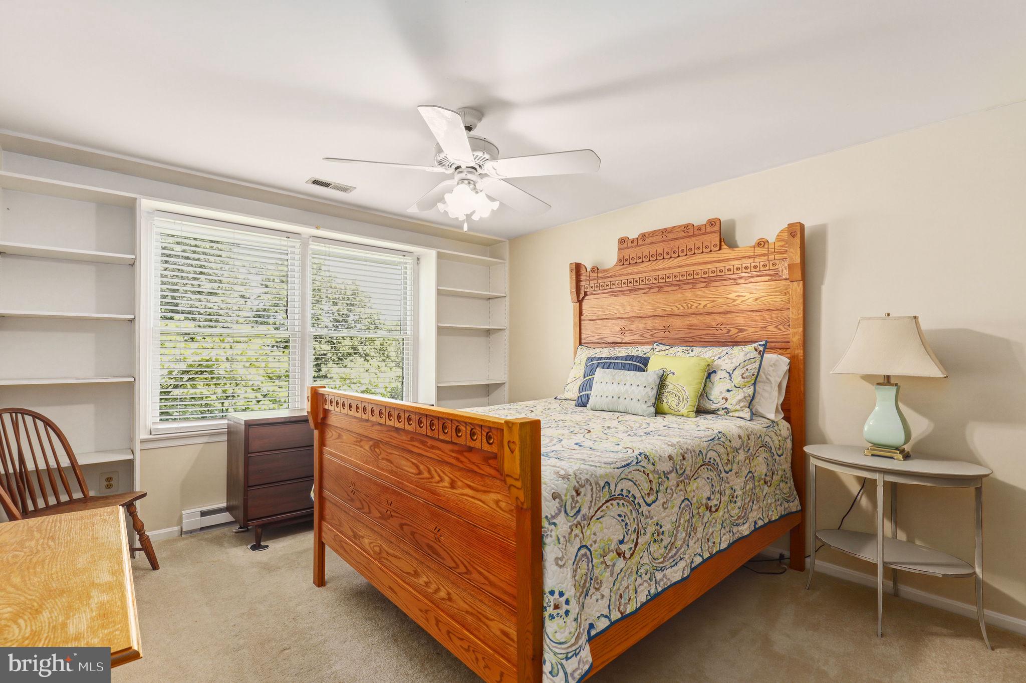 6336 Boyers Mill Road New Market, MD 21774 - Photo 18 of 49 a bedroom with a bed and a window